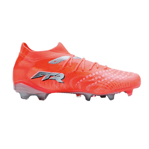 Bright orange soccer cleat with a silver "FTR" logo and textured upper, shown in profile against a solid black background.