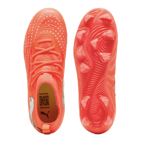 Top and bottom views of a bright orange Puma soccer cleat. Features include a textured upper with white dots, matching laces, and a studded outsole with a swirling pattern.