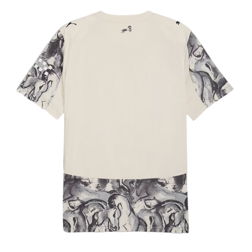 Back of an off-white t-shirt featuring grey abstract horse graphics on the sleeves and bottom hem. It includes small Puma shoulder logos and a horse emblem centered below the neckline.
