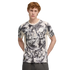 Man with curly red hair wearing a white and black marble-patterned soccer jersey with the Etihad Airways logo, posed against a solid black background.