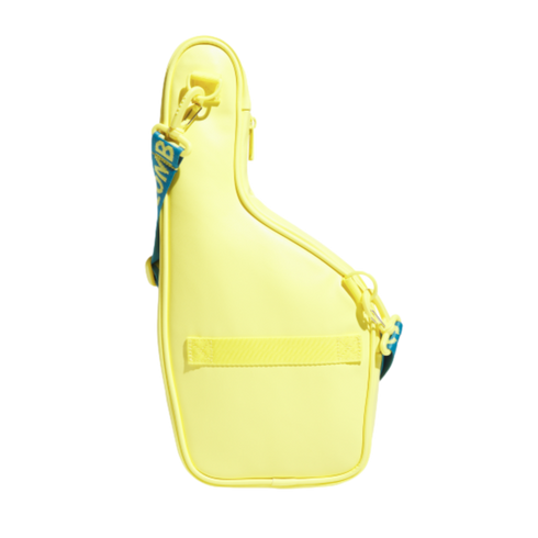 Bright yellow asymmetrical sling bag with a blue strap and yellow lettering, set against a black background.