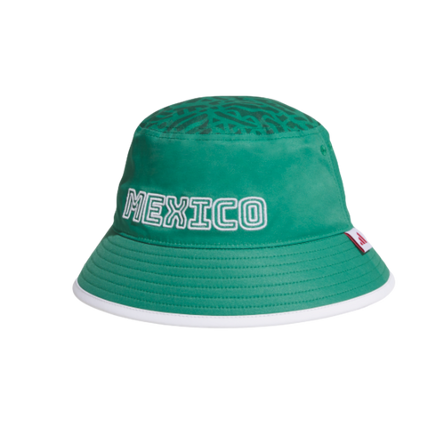 Green bucket hat with "MEXICO" in white outlined letters, a patterned crown, and white brim trim, against a black background.