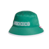 Green bucket hat with "MEXICO" in white outlined letters, a patterned crown, and white brim trim, against a black background.