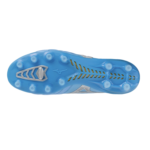 Bottom view of a light blue Mizuno soccer cleat showing the stud pattern and silver-accented soleplate.