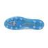 Bottom soleplate of a light blue soccer cleat with circular studs and silver and gold structural accents.