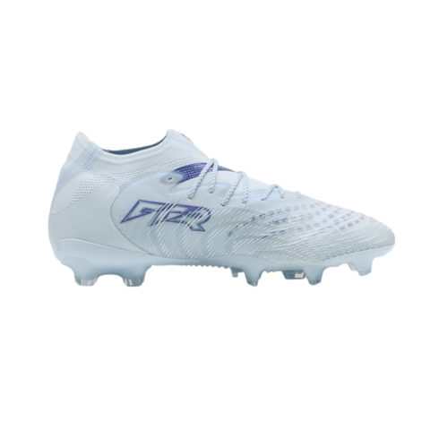 A profile view of a light blue and white soccer cleat with purple accents and a translucent studded sole, isolated on a black background.