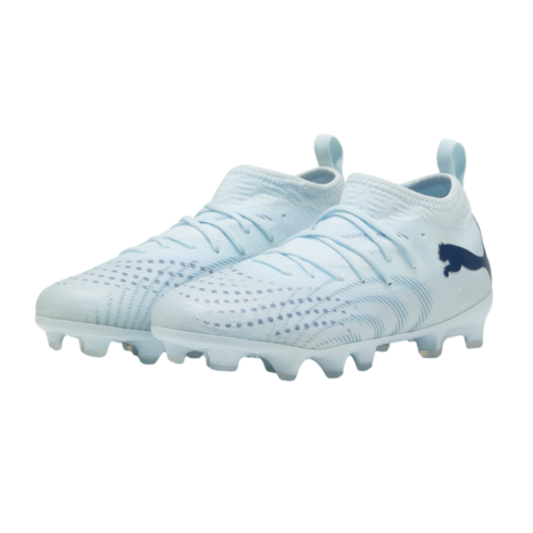 Light blue Puma soccer cleats with textured uppers and dark blue logos on a solid black background.