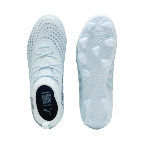 Top and bottom views of light blue Puma soccer cleats against a black background, showing the patterned upper, lacing, and studded outsole.