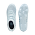 Top and bottom views of light blue Puma soccer cleats against a black background, showing the patterned upper, lacing, and studded outsole.