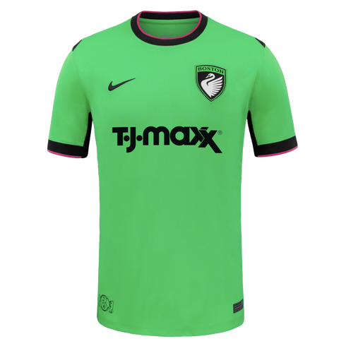 Lime green soccer jersey with black and pink trim. Features a Nike swoosh, a Boston swan crest, and a large black TJ Maxx sponsor logo on the front.