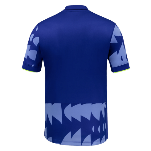 Back view of a blue polo shirt featuring light blue geometric patterns on the sleeves and lower hem, with thin neon yellow trim on the cuffs.