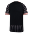 Back view of a black athletic jersey with pink trim and sleeve cuffs. The sleeves and bottom hem feature a gray and black striped pattern.