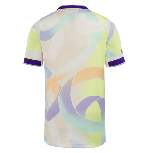 Back view of a white sports jersey with a colorful abstract pattern of thick swirling ribbons in pastel shades. The collar and sleeve cuffs have solid purple bands.