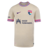 A tan Nike soccer jersey for San Diego Wave FC with colorful patterned collar and sleeve cuffs, featuring the team's crest and a Kaiser Permanente sponsor logo.