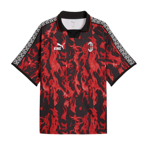 AC Milan x Puma King soccer jersey featuring a red and black flame pattern, black polo collar, and white geometric shoulder stripes.