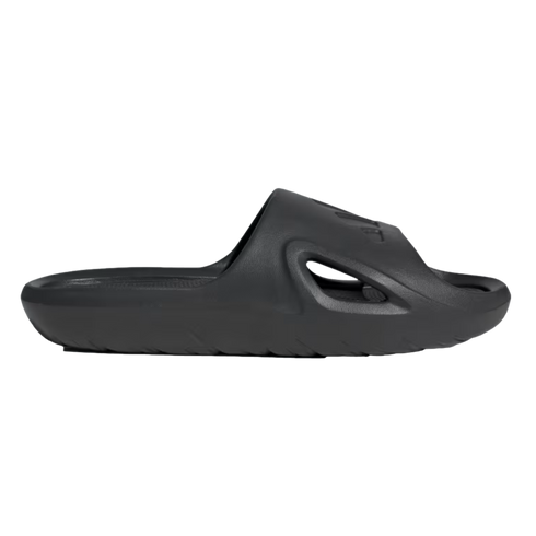 Profile view of a single all-black slide sandal featuring a thick, contoured sole and a side cutout on the strap.