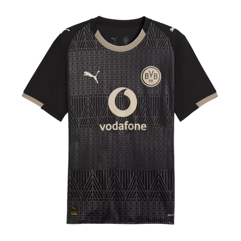 Black Borussia Dortmund (BVB) soccer jersey by Puma with geometric patterns, beige Vodafone logo, and gold trim.