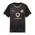 Black Borussia Dortmund (BVB) soccer jersey by Puma with geometric patterns, beige Vodafone logo, and gold trim.