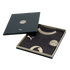 A black Borussia Dortmund soccer jersey with gold Puma and BVB logos, inside an open black presentation box.