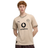 A man with curly red hair wearing a beige Borussia Dortmund soccer jersey with a Vodafone logo, posing against a black background.