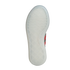 An underside view of a translucent white Adidas shoe outsole with a herringbone tread pattern, set against a black background.