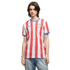 A man wearing a white and red vertically striped Paraguay national team soccer jersey and blue jeans, standing against a black background.