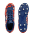 Top and bottom view of blue and red graphic Puma soccer cleats with white studs on a black background.