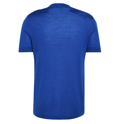 Rear view of a royal blue short-sleeved knit polo shirt with ribbed cuffs and collar on a white background.