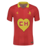 Red Charly soccer jersey with a yellow collar, featuring a large yellow heart with "CH" on the chest and a yellow silhouette of El Chapulín Colorado on the upper left.