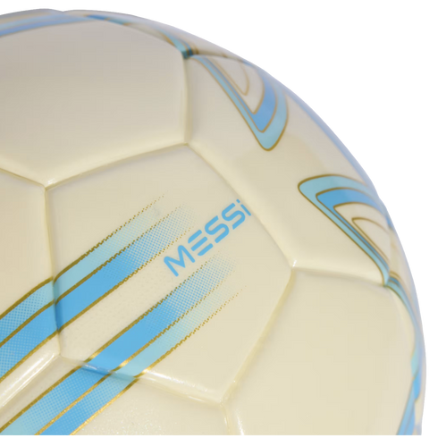 Close-up of an off-white soccer ball with blue and gold diagonal stripes and the name "MESSI" printed in blue.