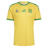 Yellow Adidas South Africa national football team jersey with green trim on the collar, sleeves, and shoulders, featuring team crests on the chest over a tonal chevron pattern.
