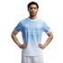 A young man wearing a light blue Manchester City soccer kit poses with his hands on his hips against a white background.