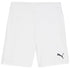 A pair of white Puma athletic shorts featuring an elastic waistband and a small black brand logo on the lower leg.