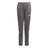 Grey Adidas track pants with three white stripes along the sides and a white logo on the left thigh.