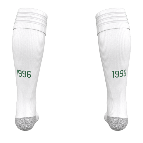 Pair of white athletic socks viewed from behind, featuring the year 1996 in green text on the calf and gray heels.