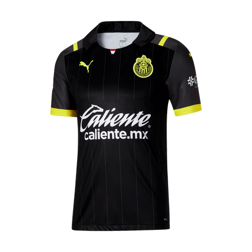 Black Puma soccer jersey for C.D. Guadalajara with neon yellow accents. Features white Caliente.mx sponsor branding, neon yellow club crest, and subtle vertical pinstripes.