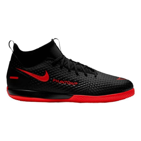 Black and red Nike Phantom GT indoor soccer shoe with a textured upper and a flat red sole.