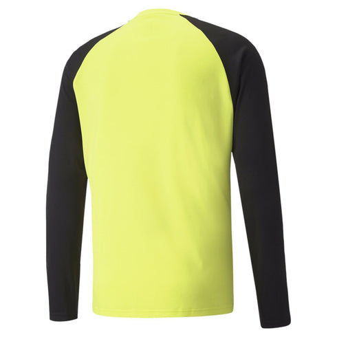 Back view of a neon yellow long-sleeved athletic shirt with black raglan sleeves.