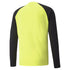 Back view of a neon yellow long-sleeved athletic shirt with black raglan sleeves.