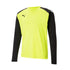 Puma long-sleeved athletic shirt with a neon yellow torso, black sleeves featuring white shoulder accents, and a black logo on the chest.
